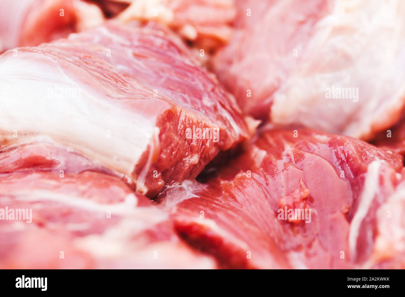 Fresh red beef pieces, macro photo with soft selective focus Stock Photo