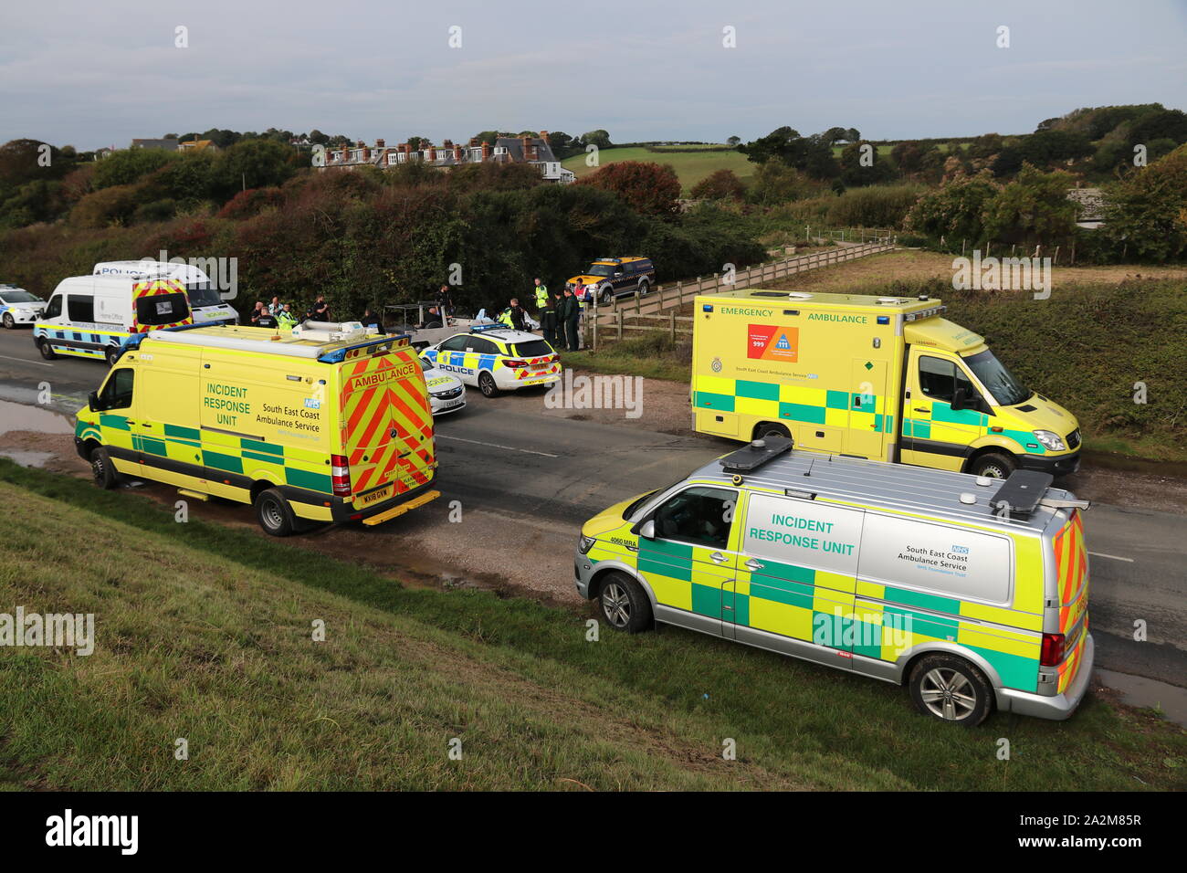 MIGRANTS ARRIVING AT A SOUTH COAST BEACH IN OCTOBER 2019 AND BEING DEALT WITH BY HOME OFFICE IMMIGRATION ENFORCEMENT AND EMERGENCY SERVICES Stock Photo