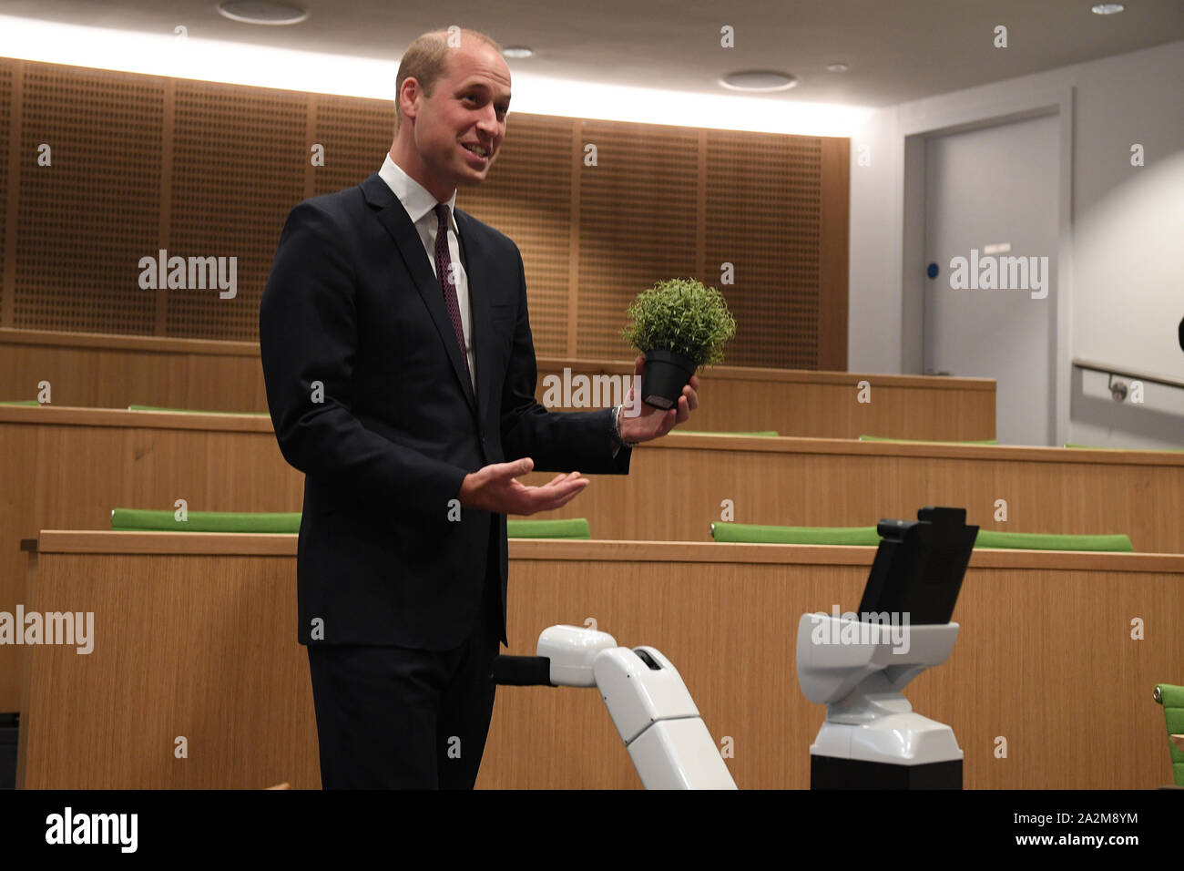 The Duke of Cambridge interacts with Bambam, a robot designed to ...
