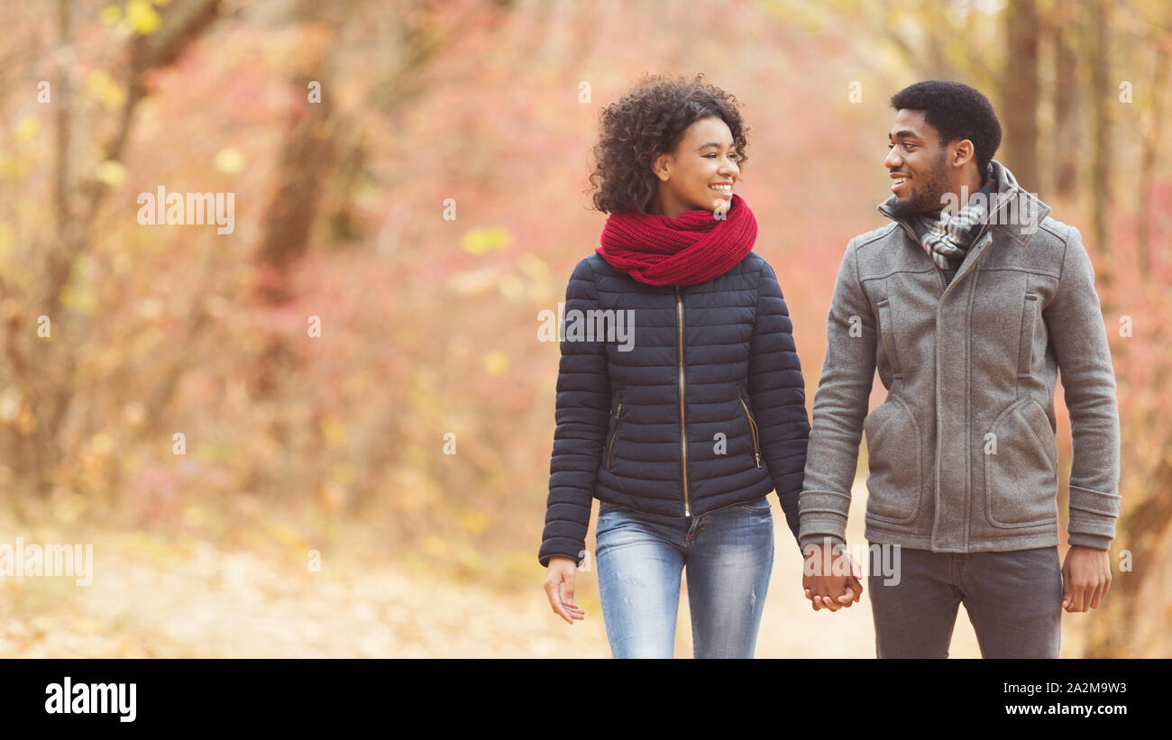 African american couple walking park hi-res stock photography and ...