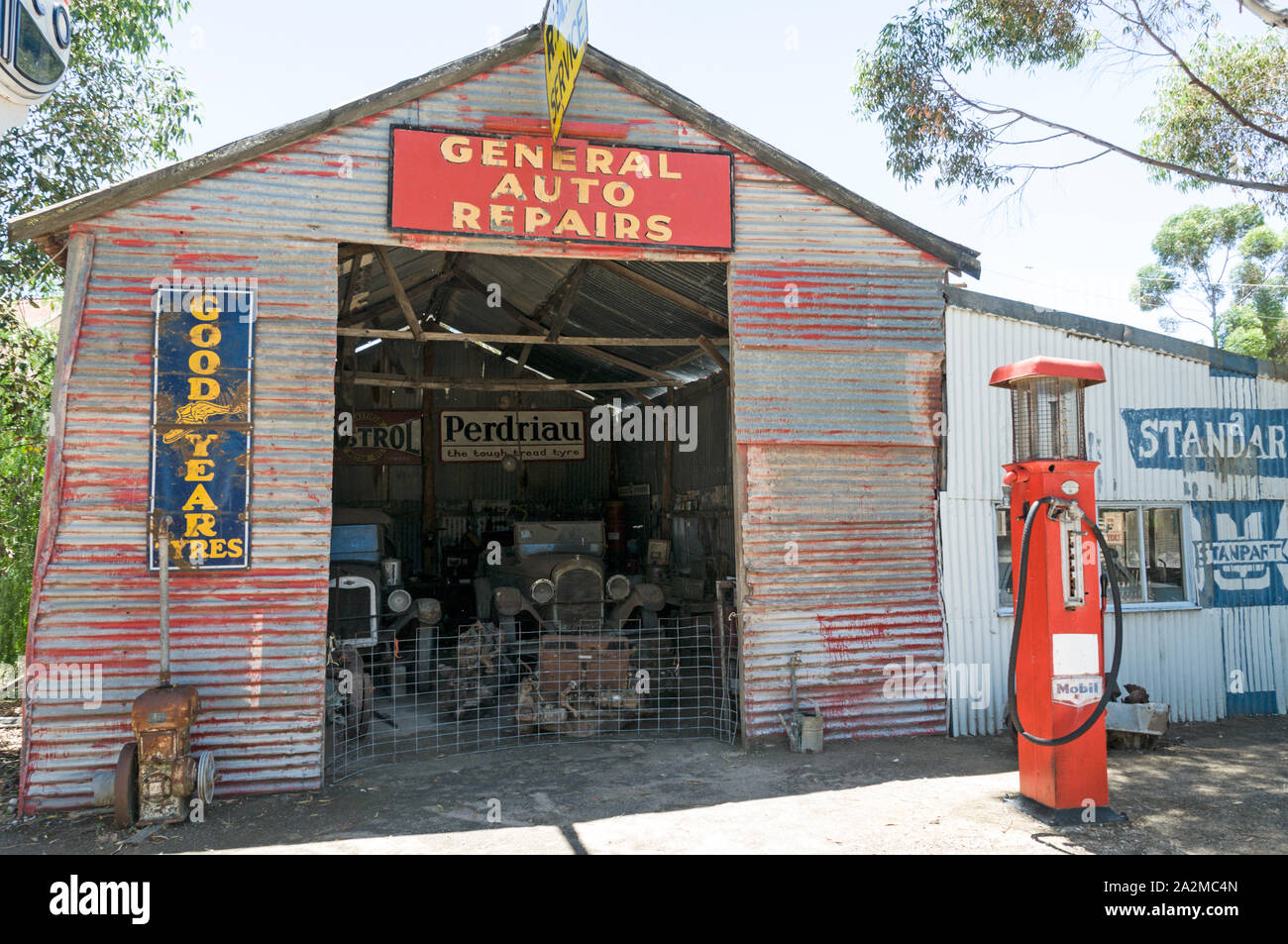 Old Tailem Town Pioneer Village, Australia’s largest pioneer village museum.   The main garage for auto repairs in the main street at the open-air mus Stock Photo