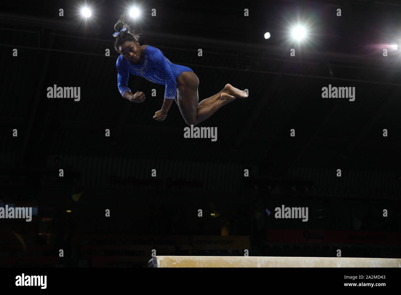 Stuttgart, Germany. 1st Oct, 2019. Gymnast Simone Biles from the USA during the podium training day at the 2019 World Artistic Gymnastics Championships in Stuttgart, Germany. Biles warms up a double-twisting double back dismount, a skill she hopes will be named after her. Melissa J. Perenson/CSM/Alamy Live News Stock Photo