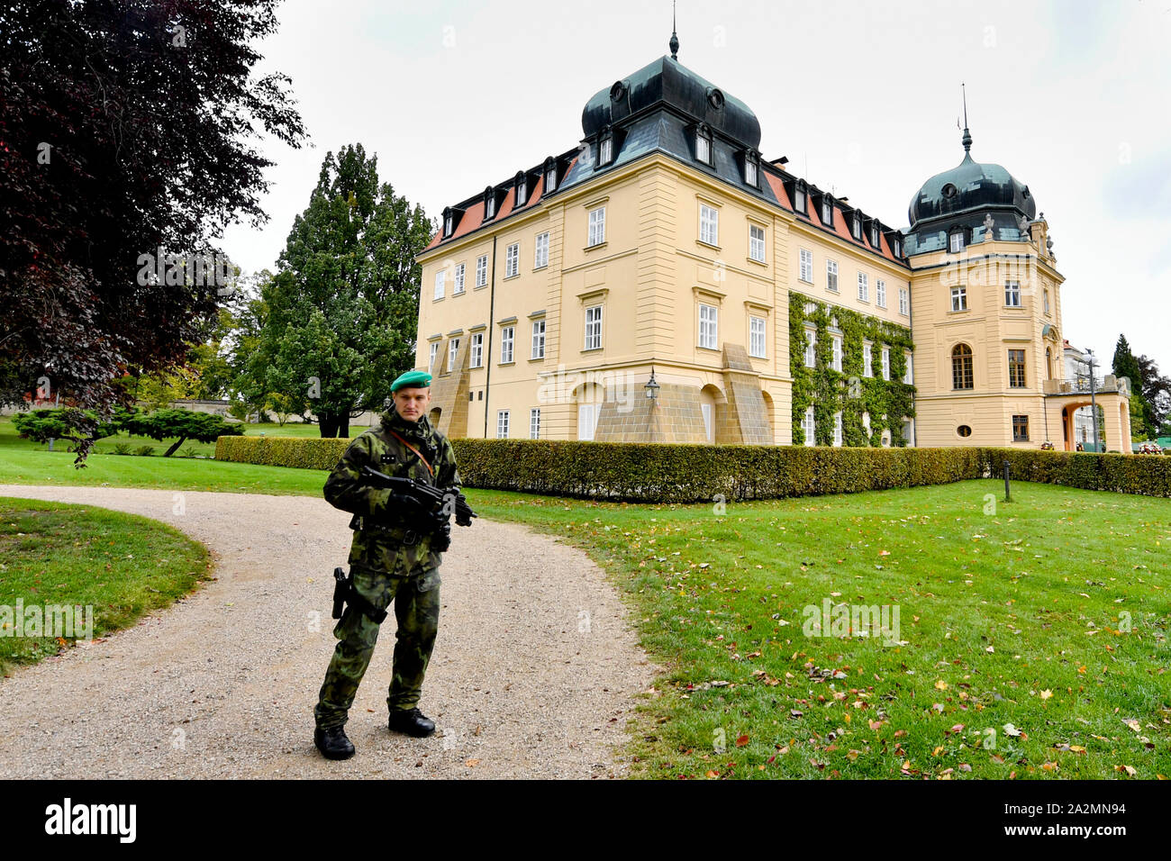 Heavily armed Prague Castle Guard soldier guards the Lany chateau, Czech Republic, on Thursday, October 3, 2019, during the plenary session of Visegra Stock Photo