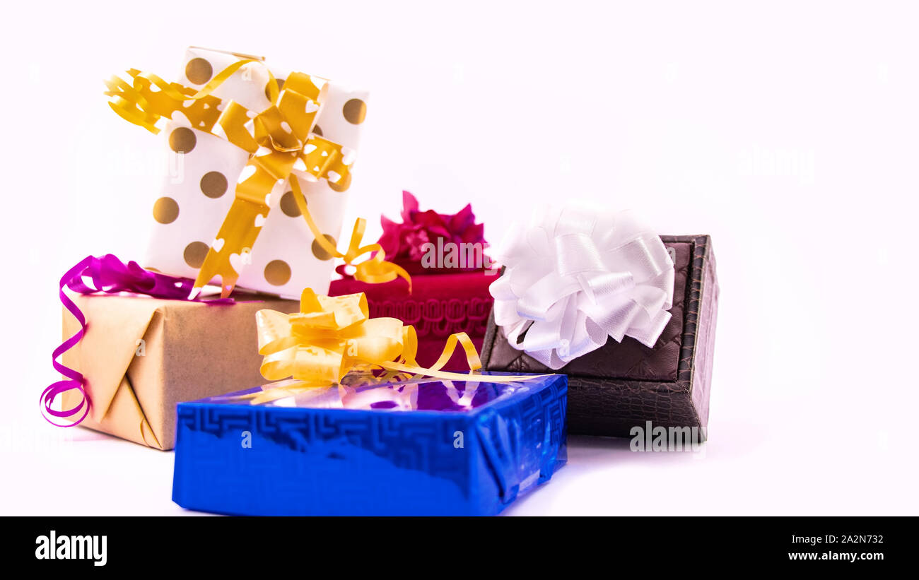 Set of colorful gift boxes with bows and ribbons on white background ...