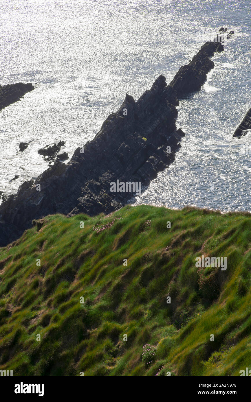rocky jagged coastline and cliffs in county kerry ireland on the wild atlantic way Stock Photo