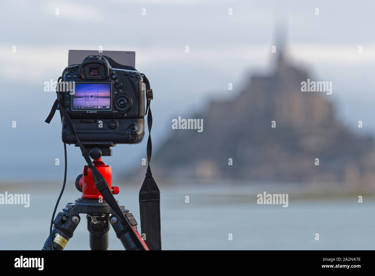 MONT ST-MICHEL, FRANCE, September 28, 2019 : Taking pictures of the Mount at dawn. Mont Saint-Michel and its bay are on the list of World Heritage Sit Stock Photo