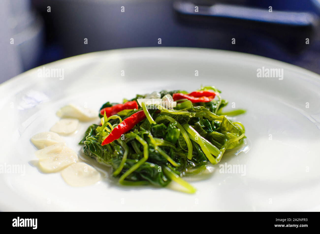 Stir fried water spinach, Indonesian dish Stock Photo - Alamy