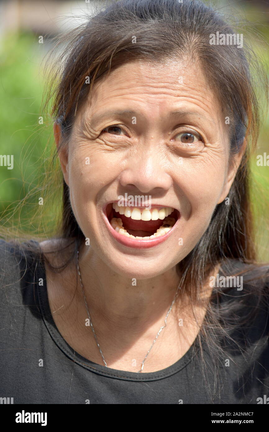 An Old Female Senior Smiling Stock Photo