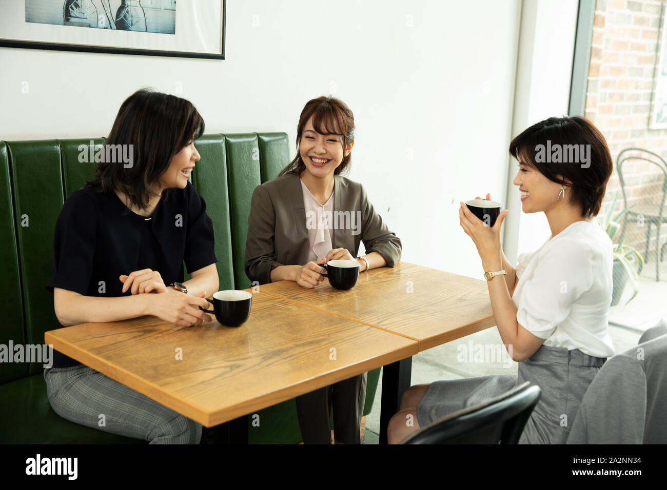Japanese women at a cafe Stock Photo - Alamy