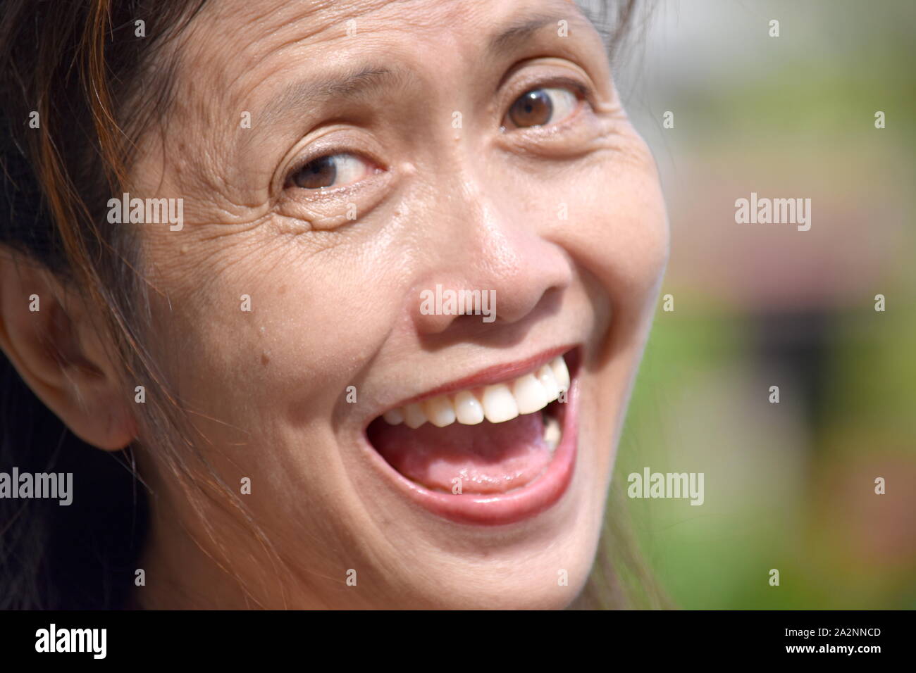 A Diverse Female Senior And Laughter Stock Photo