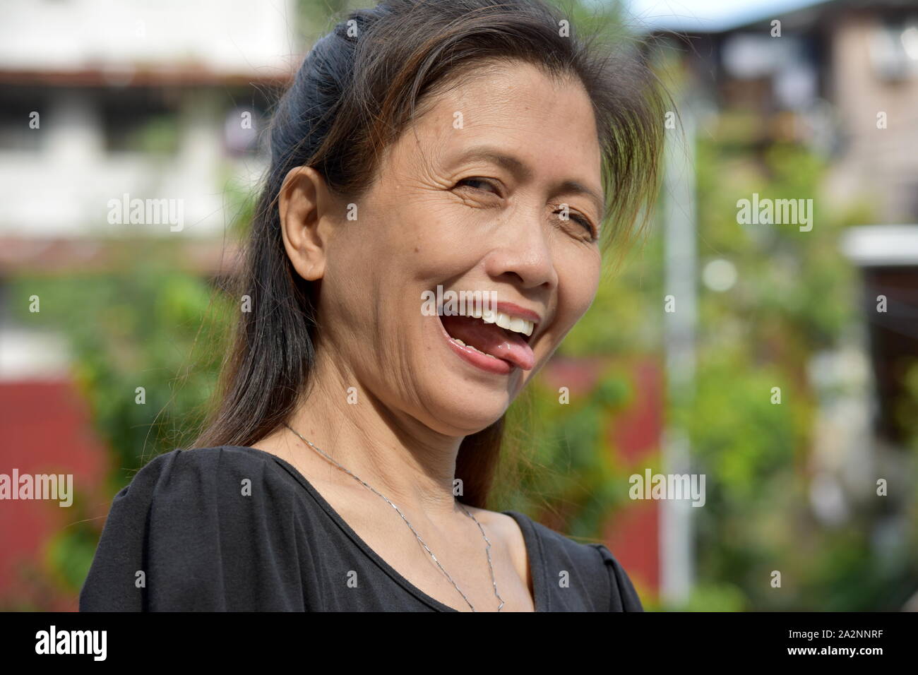 An Insane Filipina Person Stock Photo
