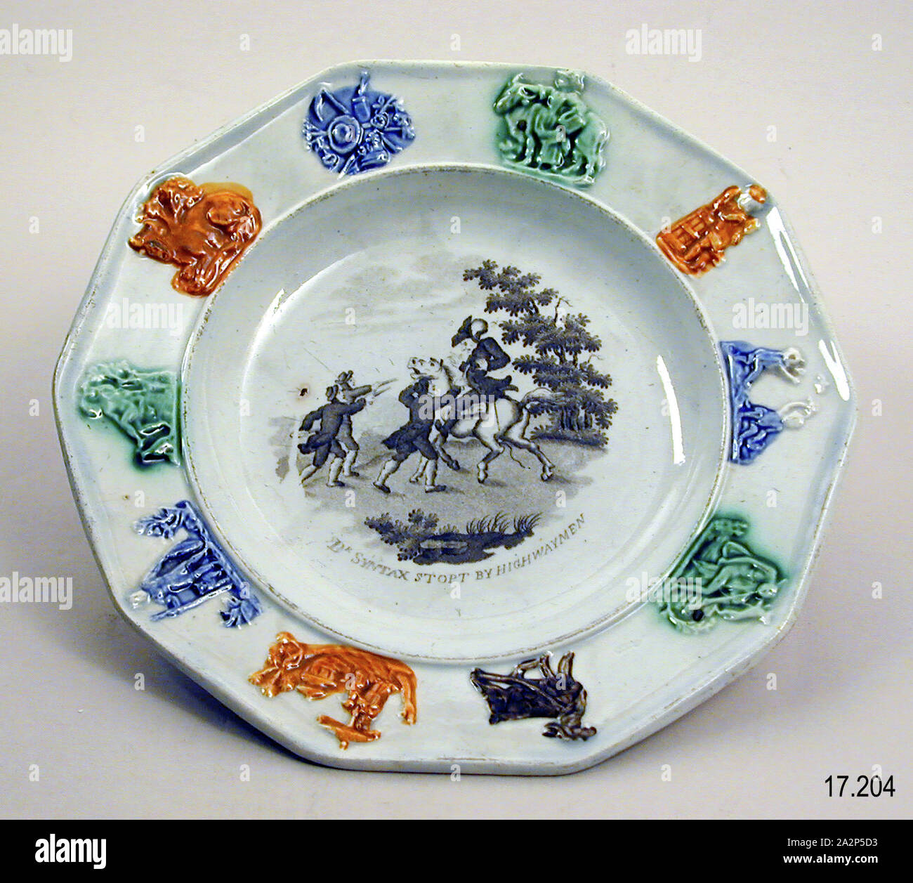Dr. Syntax Stopt by Highwaymen Plate, 19th Century, Transfer-printed glazed earthenware, 1 x 8 x 7 3/4 in. (2.5 x 20.3 x 19.7 cm Stock Photo