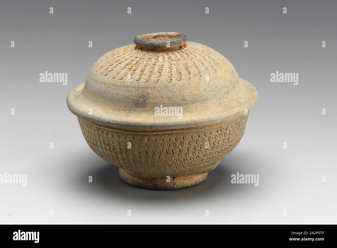 Unknown (Korean), Cinerary Urn, late 7th/early 8th Century, Gray stoneware with stamped design, Overall (Bowl): 2 3/8 × 5 3/8 inches (6 × 13.7 cm Stock Photo