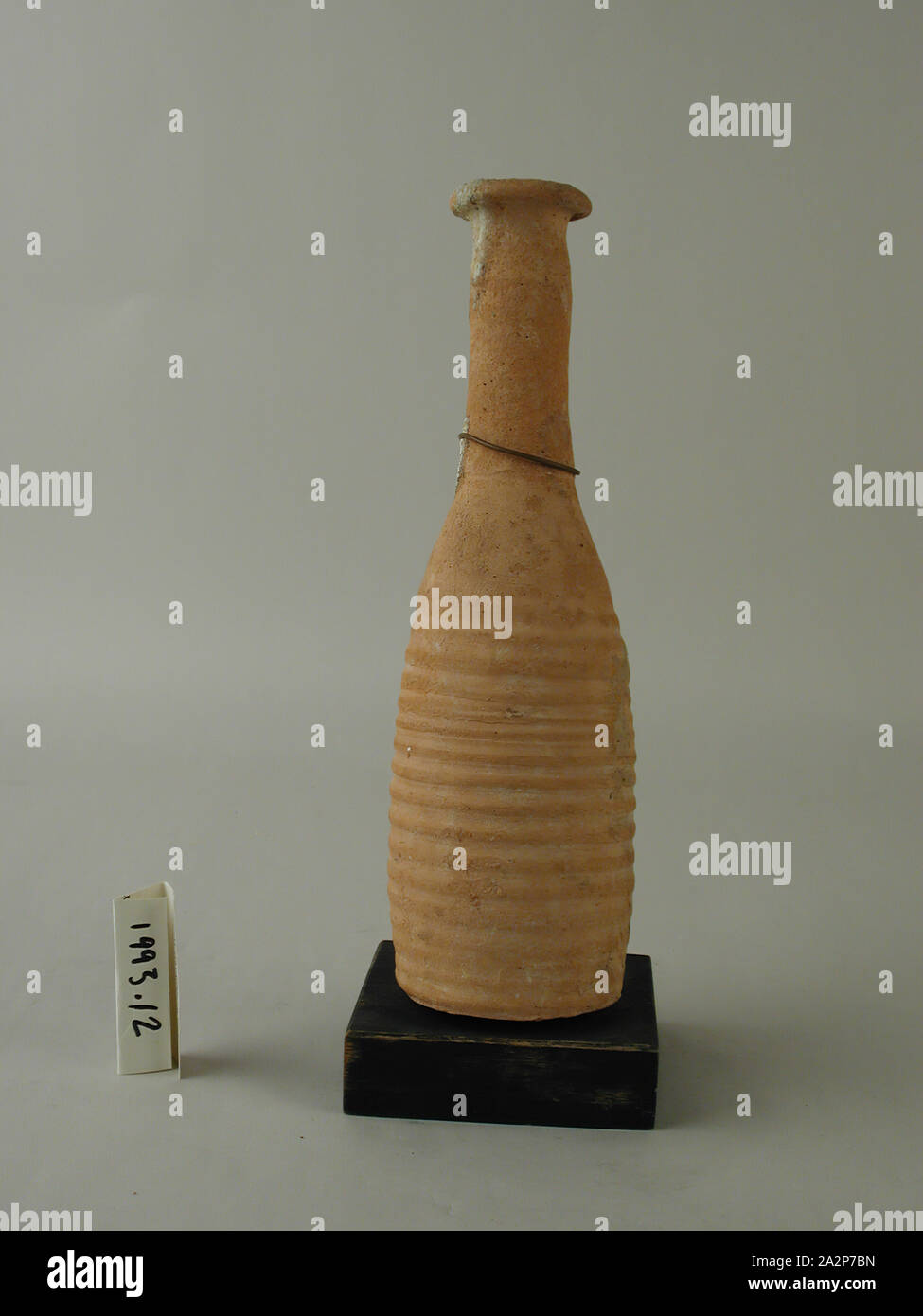 Roman, Unguentarium, 5th or 6th century CE, ceramic, Including base: 9 1/8 × 3 inches (23.2 × 7.6 cm Stock Photo