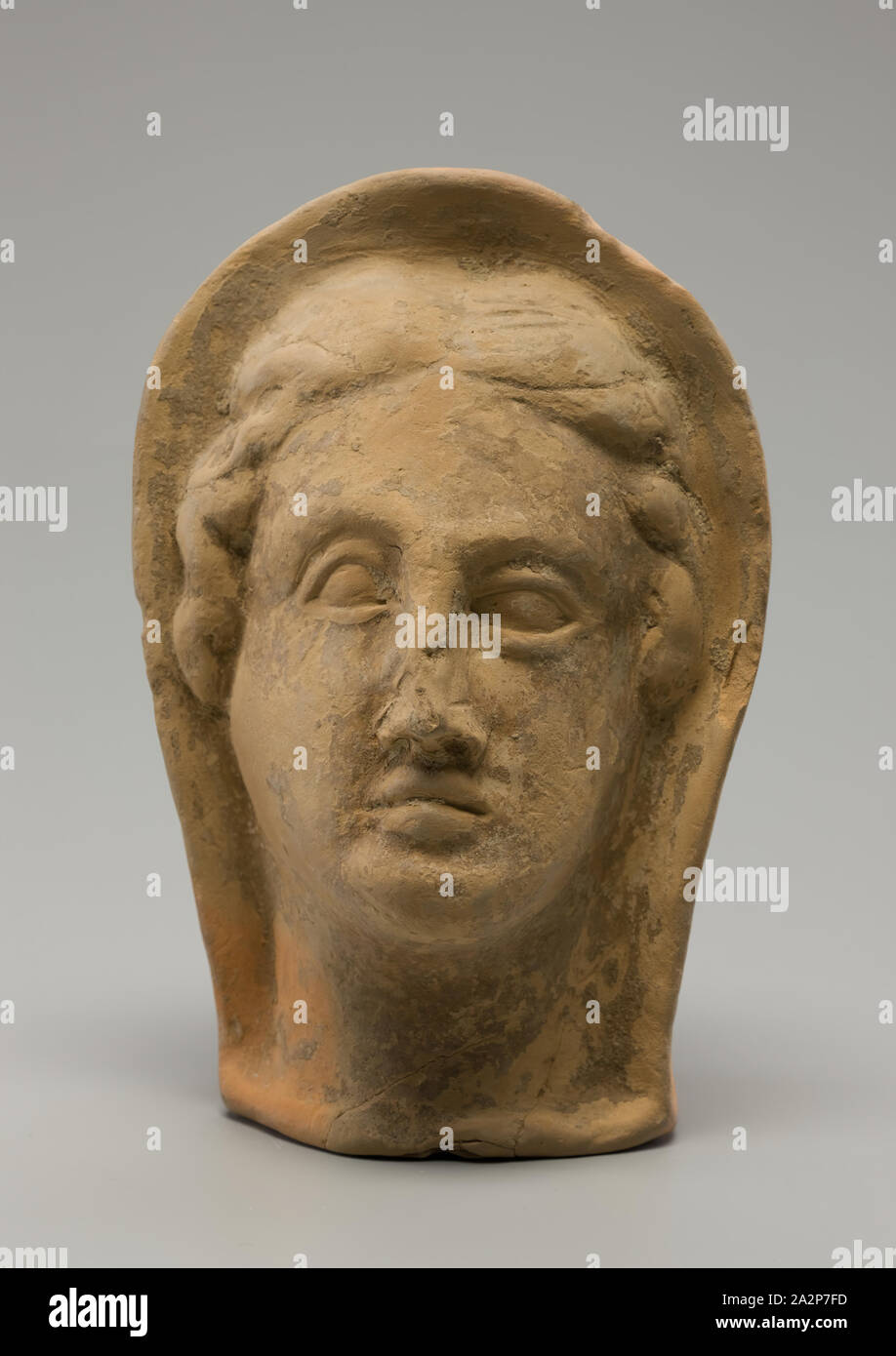 possibly Etruscan, possibly Italic, Head of a Woman, 3rd or early 2nd century BCE, Terracotta, Overall: 6 3/4 × 4 3/8 × 4 inches (17.1 × 11.1 × 10.2 cm Stock Photo