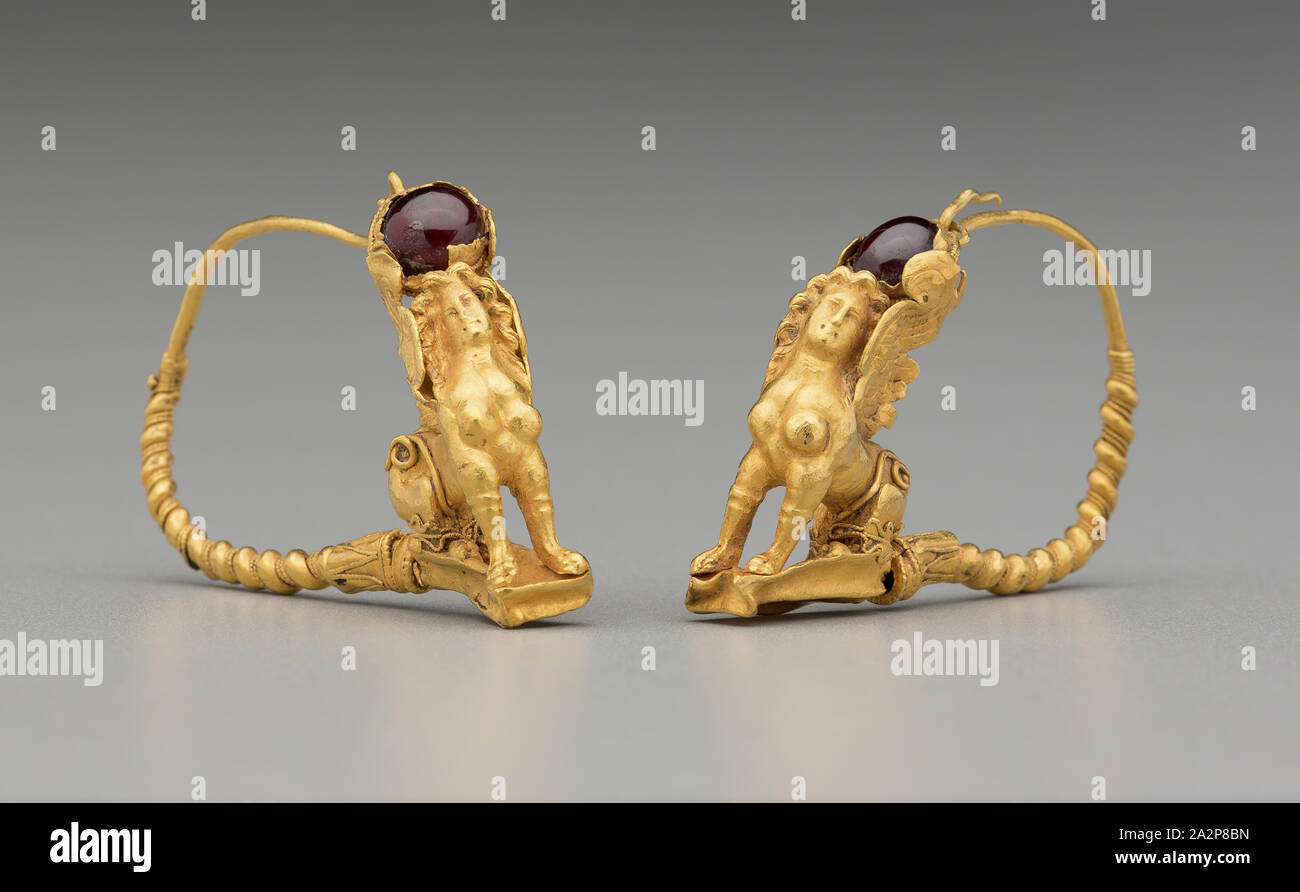 Greek, Earring, 3rd or 2nd century BCE, gold and garnet, Overall: 1 1/2 × 1/2 × 1 7/8 inches (3.8 × 1.3 × 4.8 cm Stock Photo