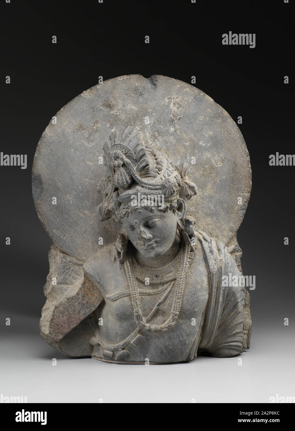 Unknown (Gandharan), Bodhisattva, between 200 and 400, Gray schist, Overall: 20 1/2 × 16 1/2 × 7 3/4 inches (52.1 × 41.9 × 19.7 cm Stock Photo