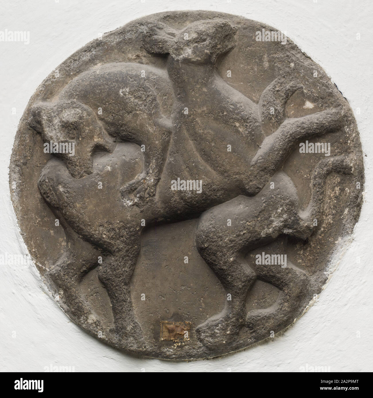 Unknown (Italian), Roundel with Lion Attacking a Deer, between 12th and 13th century, stone, Overall: 12 1/2 inches (31.8 cm Stock Photo