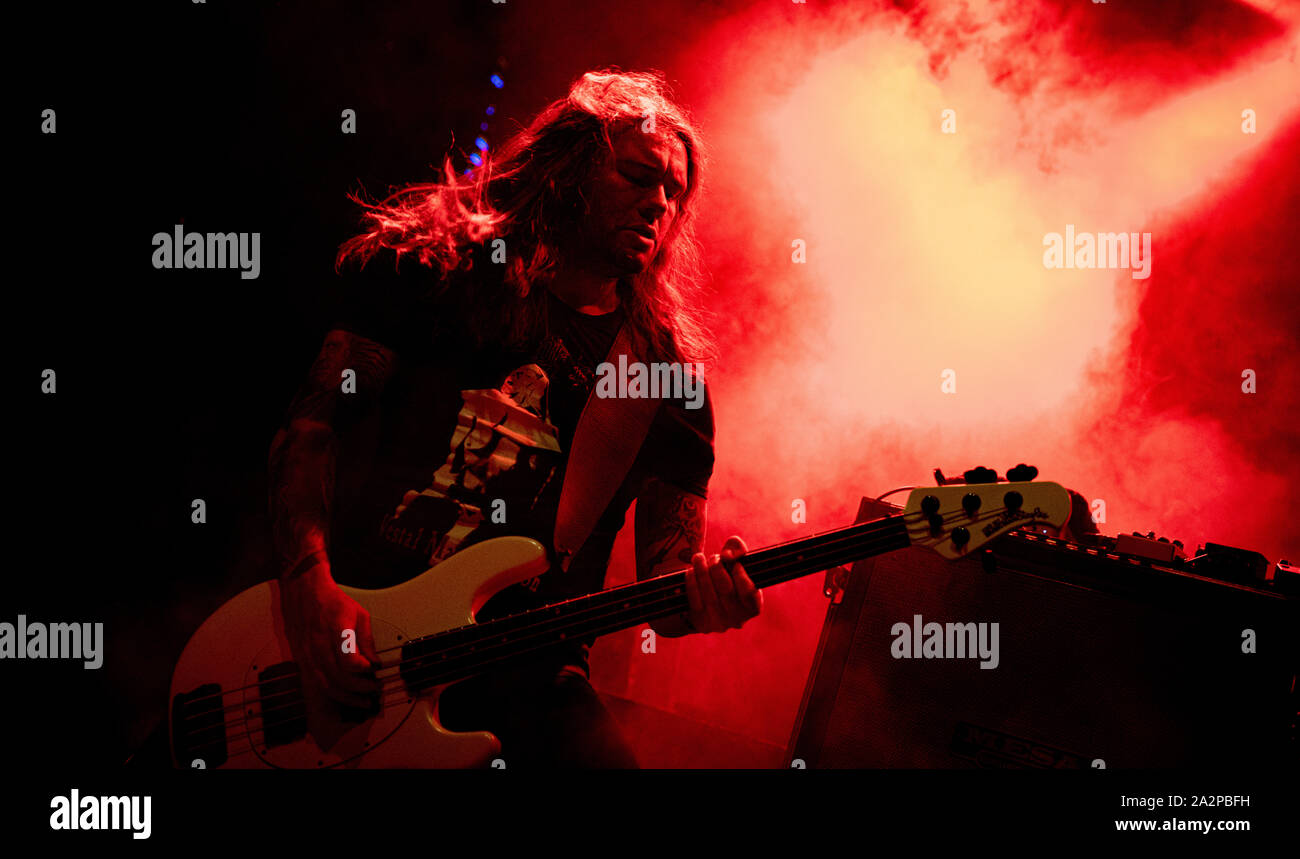Copenhagen, Denmark. 2nd Oct, 2019. The American metalcore band Unearth  performs a live concert at Amager Bio in Copenhagen. Here bass player Chris  O'Toole is seen live on stage. (Photo Credit: Gonzales