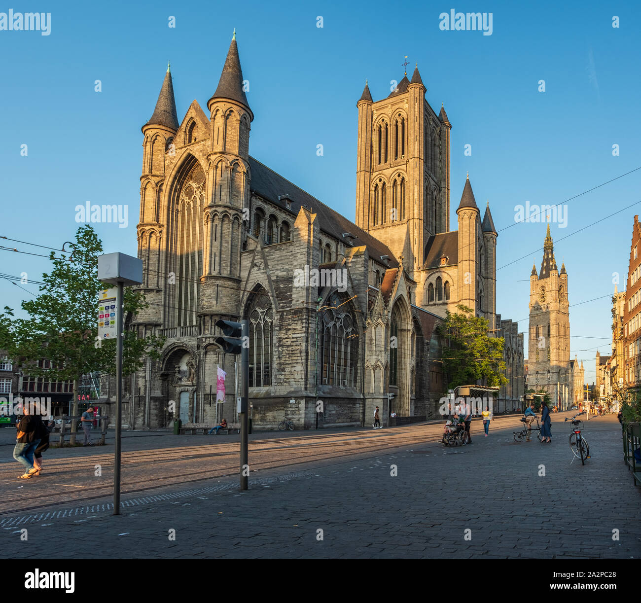Saint Nicholas' Church and Belfry of Ghent at Corn Market during the afternoon. Historical center of Ghent, Flemish Region, Belgium, EU. Stock Photo