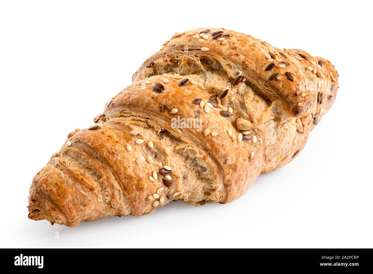 Whole wheat croissant with linseeds and sesame seeds isolated on white