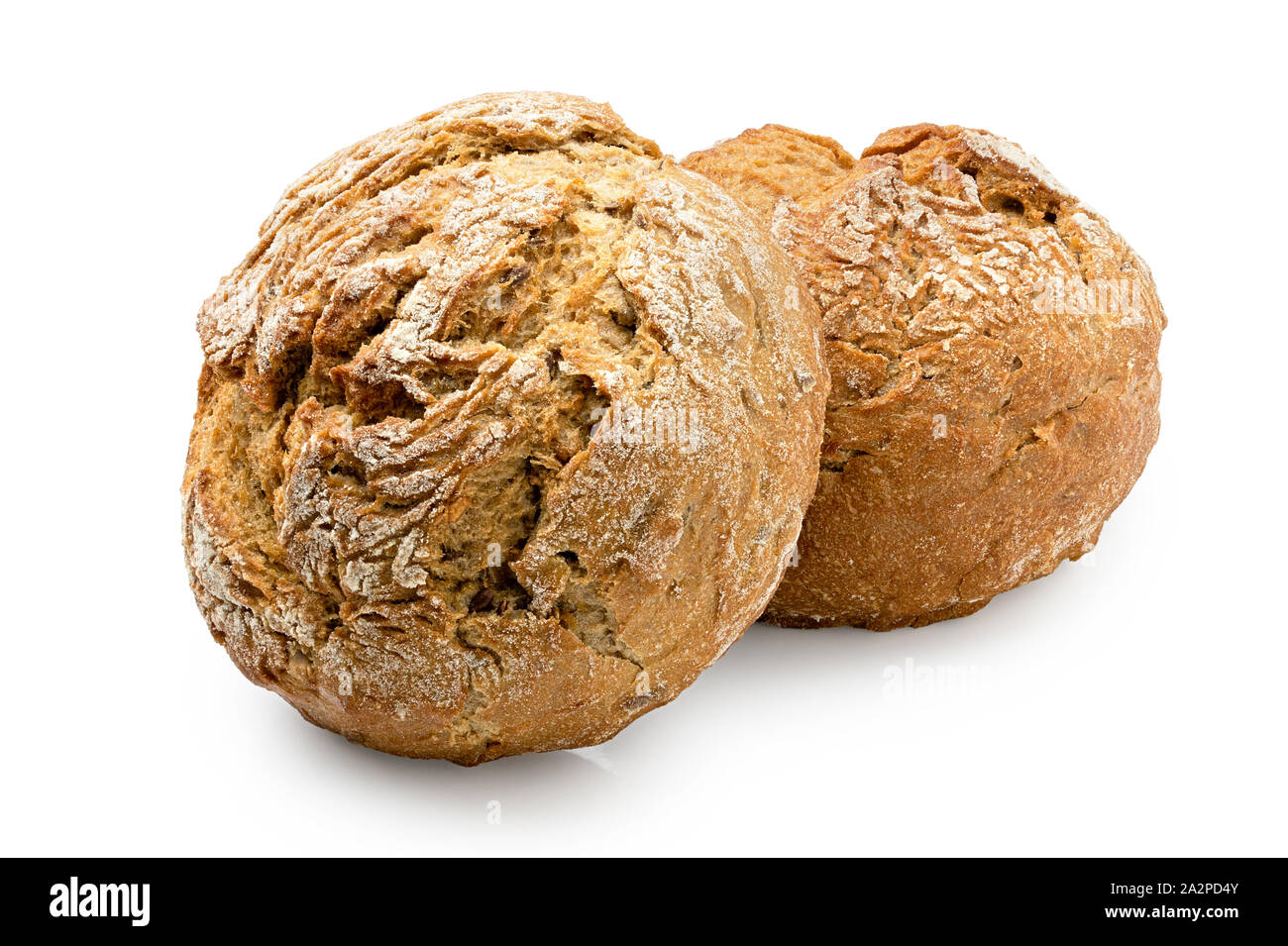 Two round rustic whole wheat bread rolls isolated on white. Stock Photo