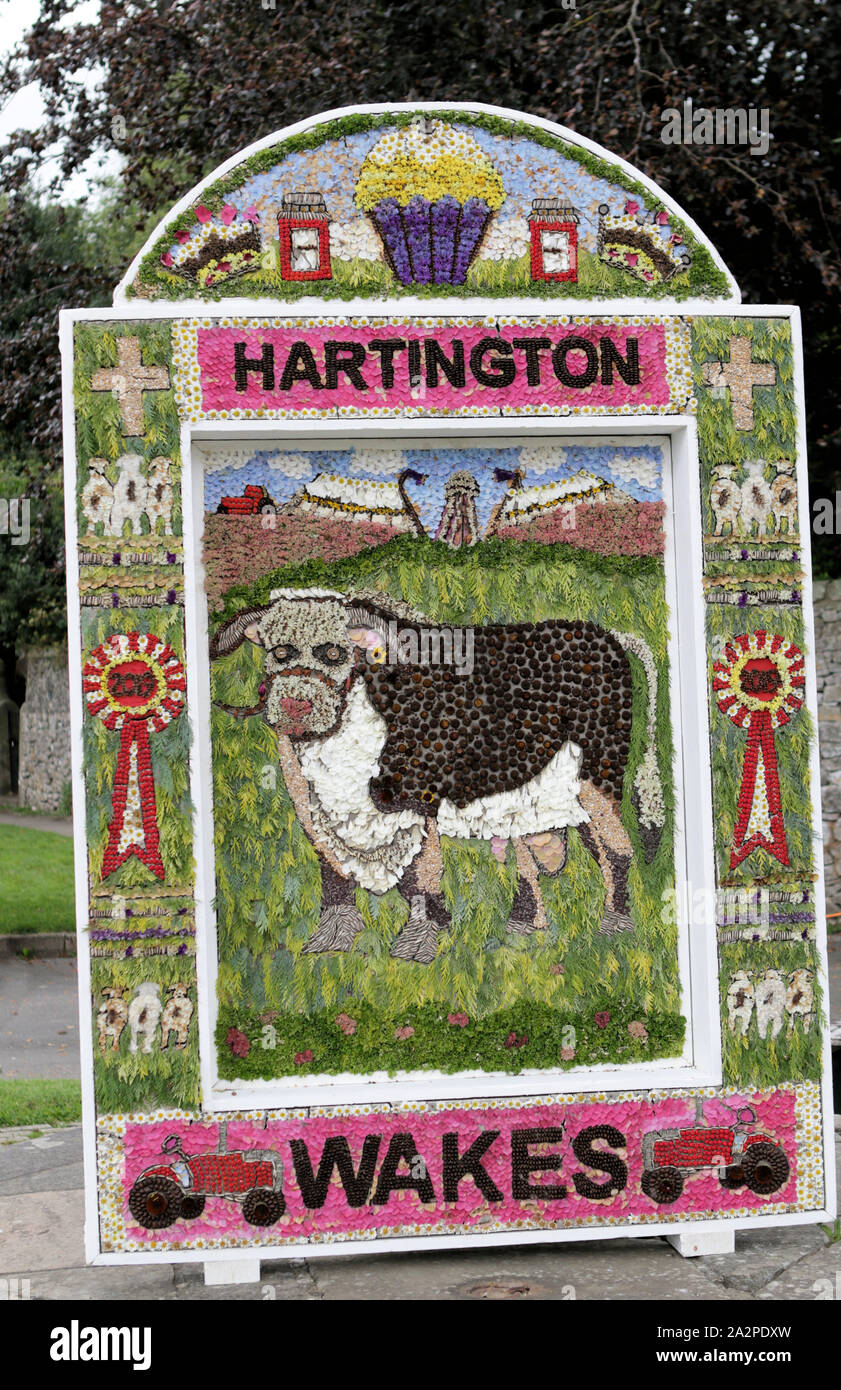 A Derbyshire well dressing sign advertising Hartington Wakes Stock Photo