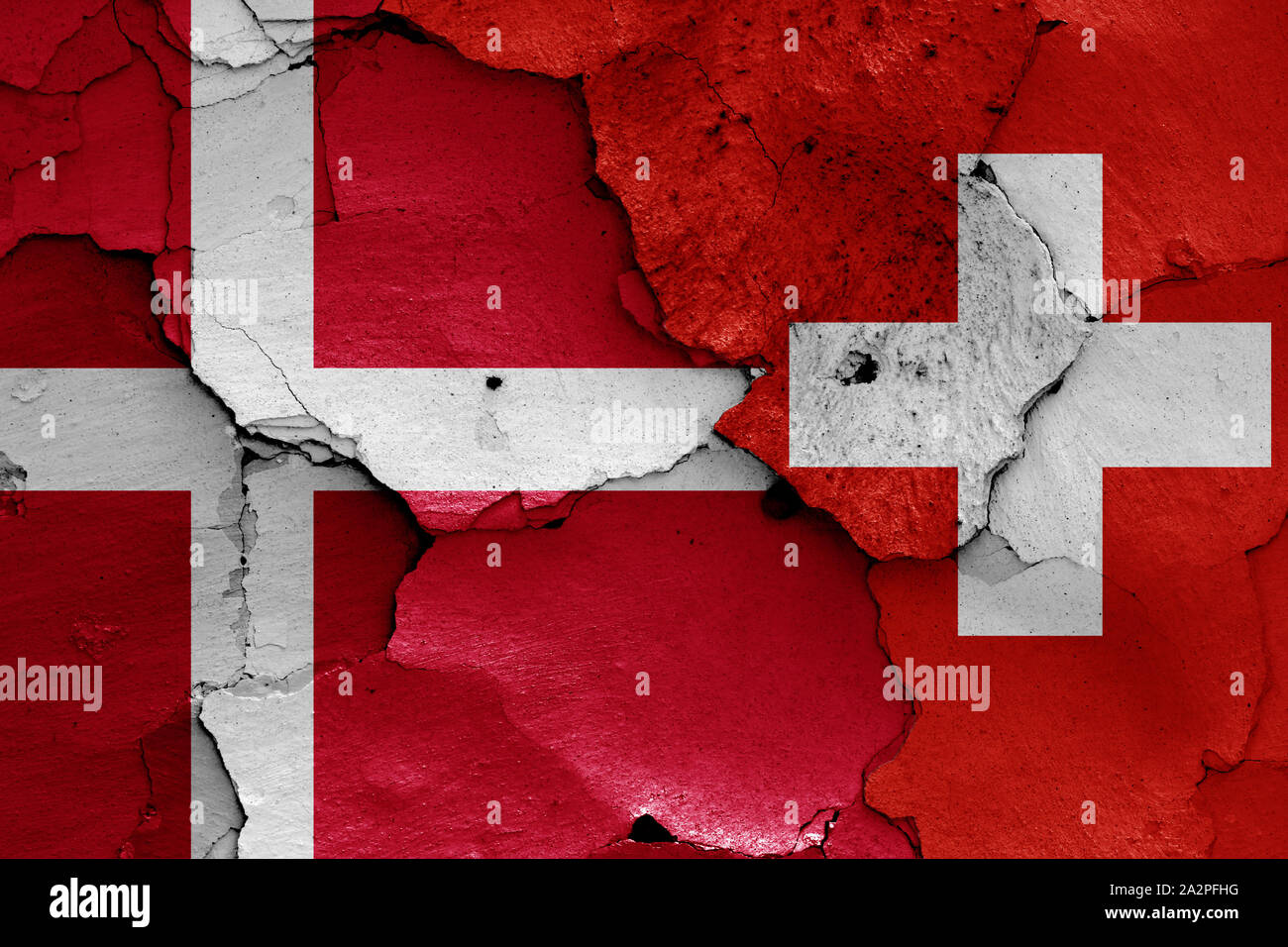 flags of Denmark and Switzerland painted on cracked wall Stock Photo ...