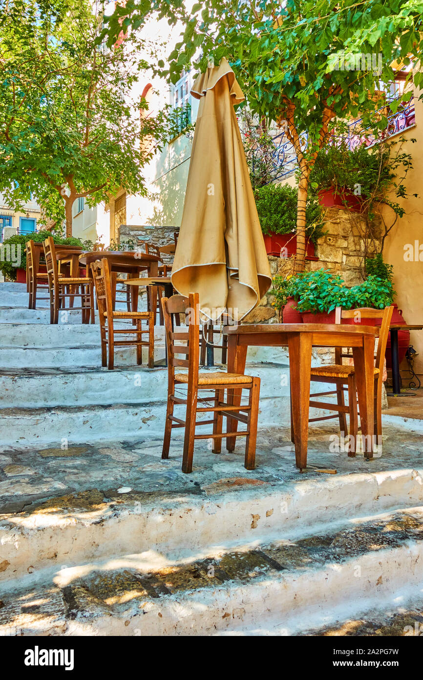 Street cafe on the stairs in Plaka district in Athens, Greece Stock Photo