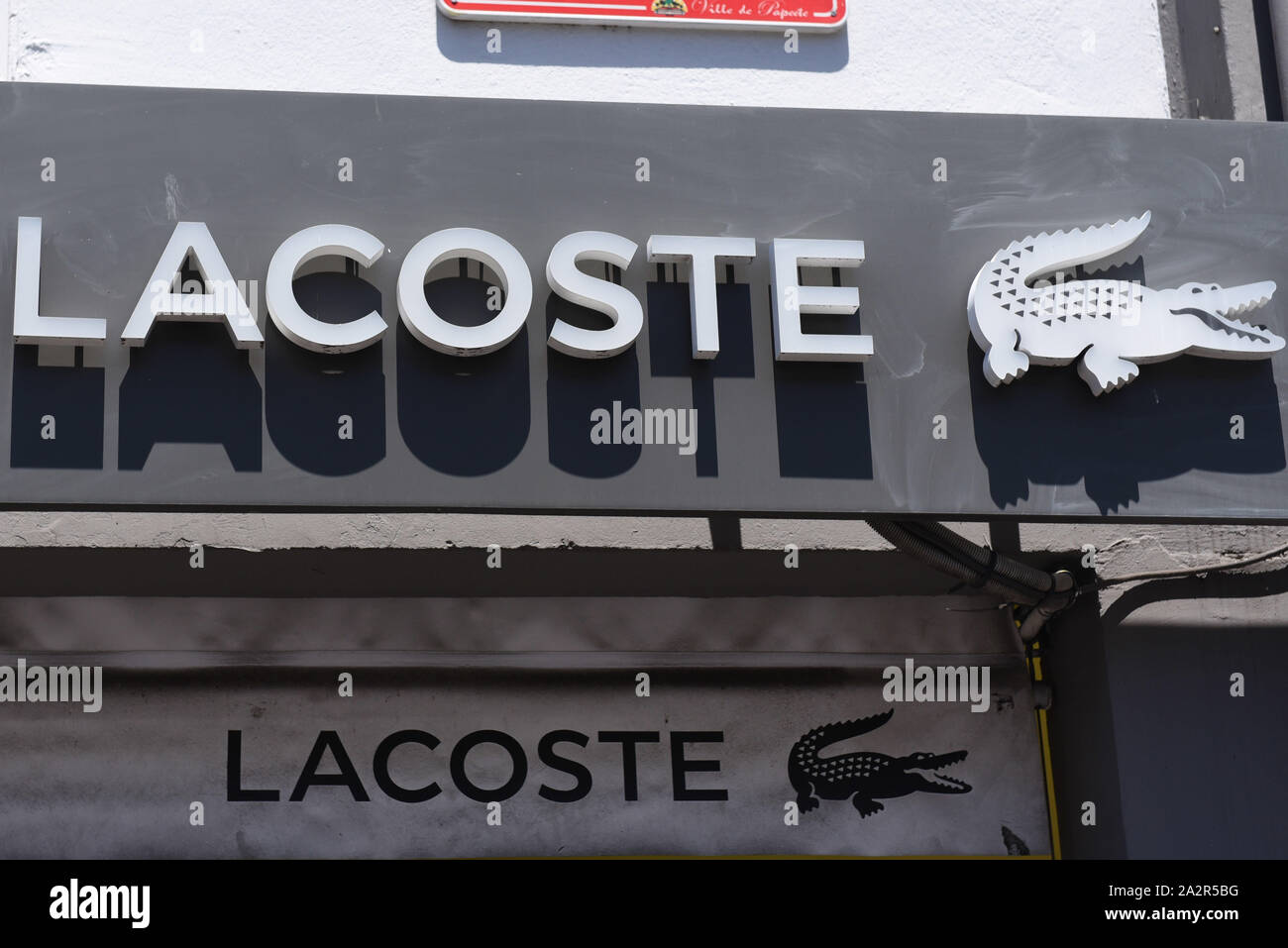Papeete, French Polynesia. 30th Sep, 2019. The Lacoste logo seen at a Lacoste Store in Papeete. Credit: John Milner/SOPA Images/ZUMA Wire/Alamy Live News Stock Photo