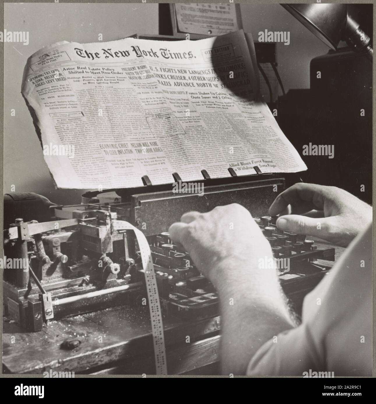 Radio room of the New York Times newspaper; Radio room of the New York Times newspaper Times news passed by naval censor (see stamps on paper) is sent out twice daily by the Times' own short wave radio transmitter in international Morse code, and received by ships.; Stock Photo