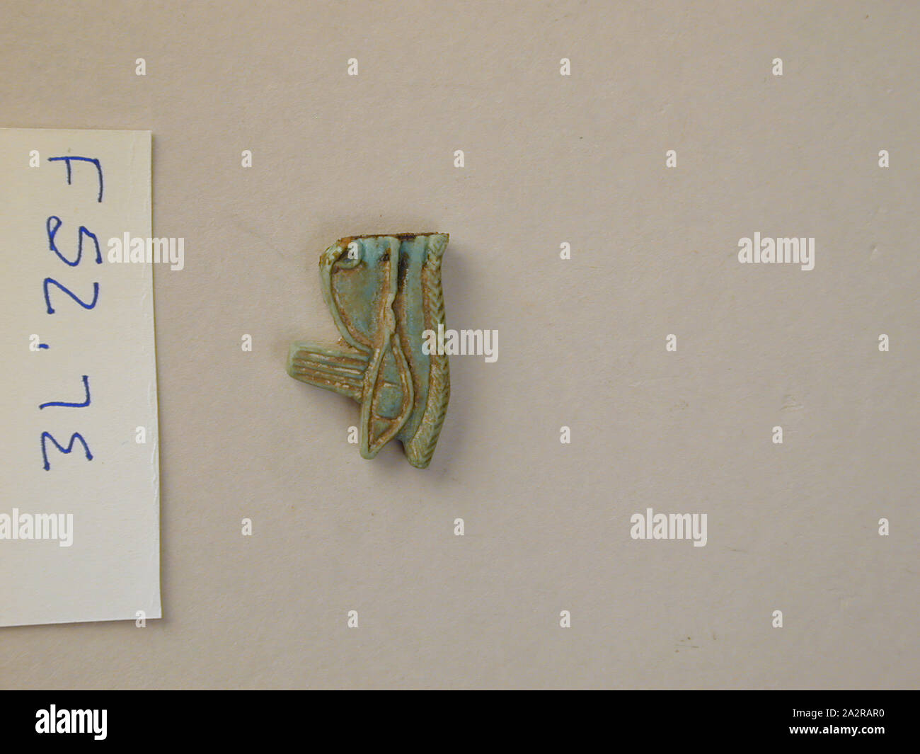 Egyptian, Eye of Horus, 1500/550 BC, Faience, Overall: 5/8 × 1 × 1/4 inches (1.6 × 2.5 × 0.6 cm Stock Photo