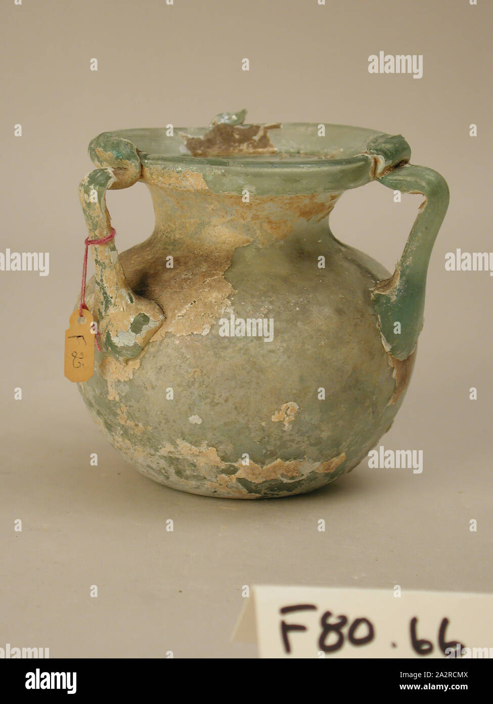 Roman, Jar, 4th Century AD, Glass, H. with handles 3 5/8 x D. with handles 3 7/8 in Stock Photo