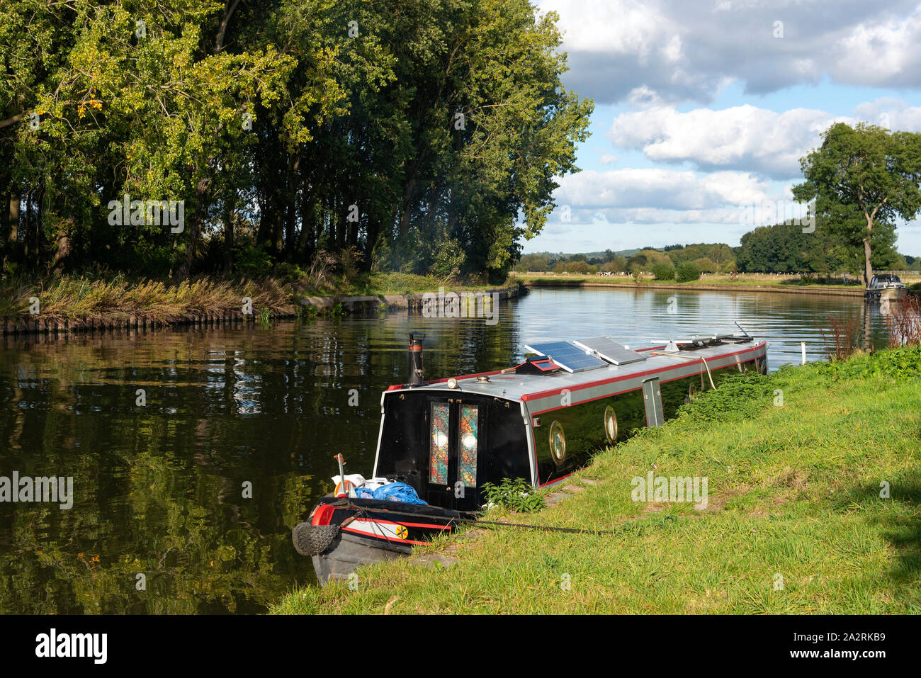 Narrow boat on an autumn afternoon moored up on the River Thames at Sonning-on-Thames, Berkshire, England, UK Stock Photo