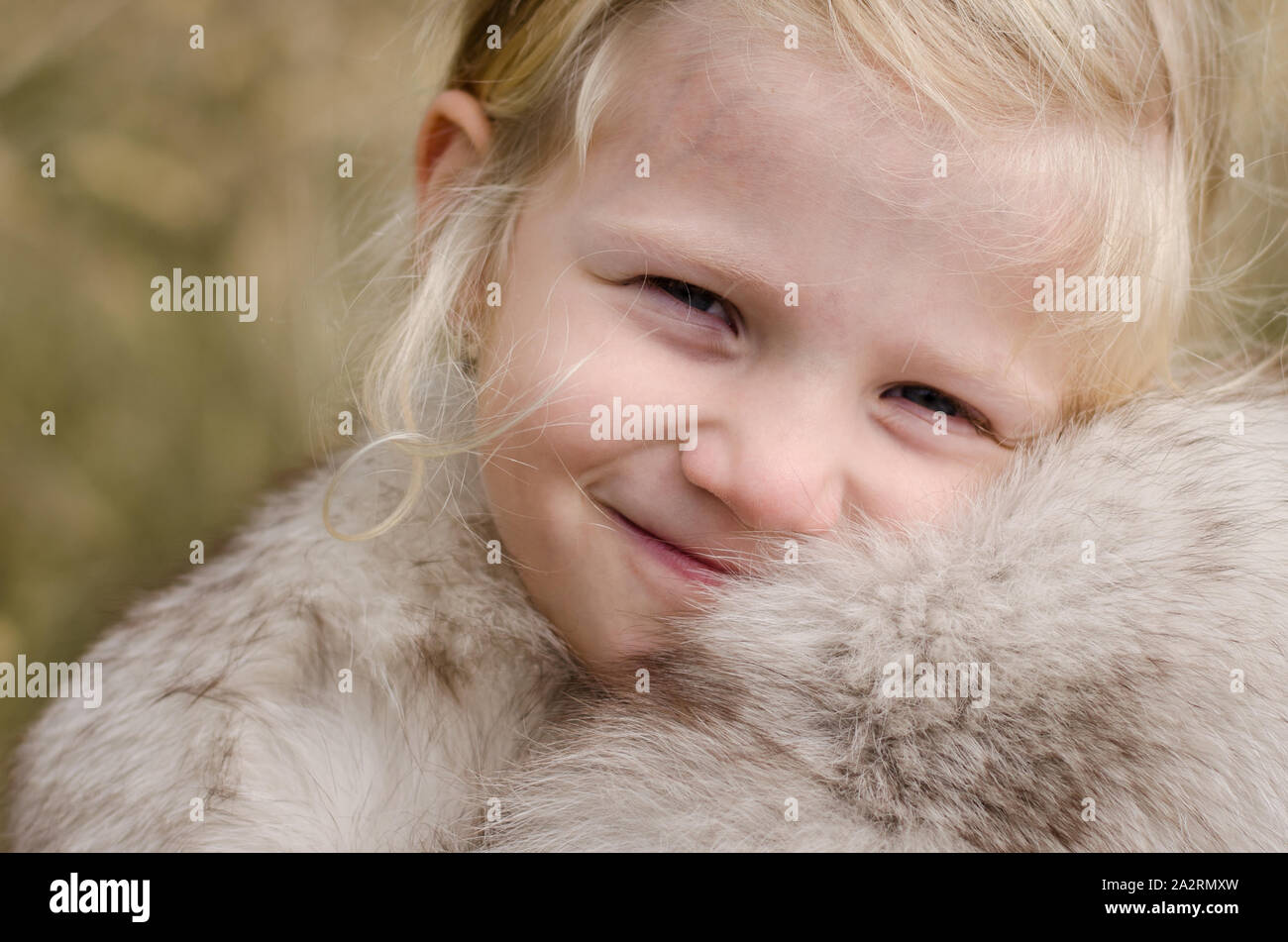 beautiful little happy smiling blond girl portrait Stock Photo - Alamy