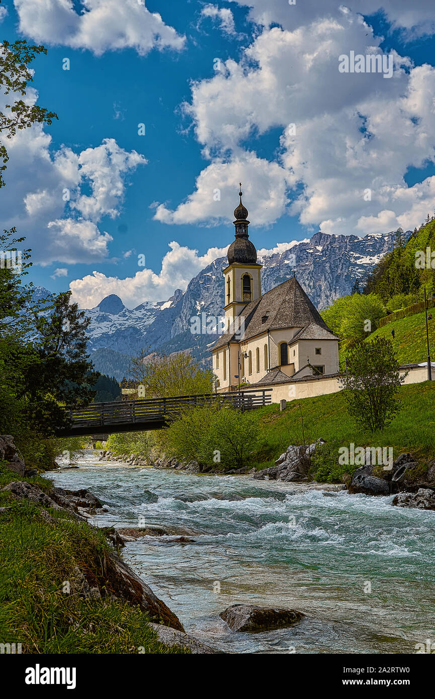 Scenic mountain landscape in the Bavarian Alps with famous Parish Church of St. Sebastian in the village of Ramsau, Nationalpark Berchtesgadener Land Stock Photo