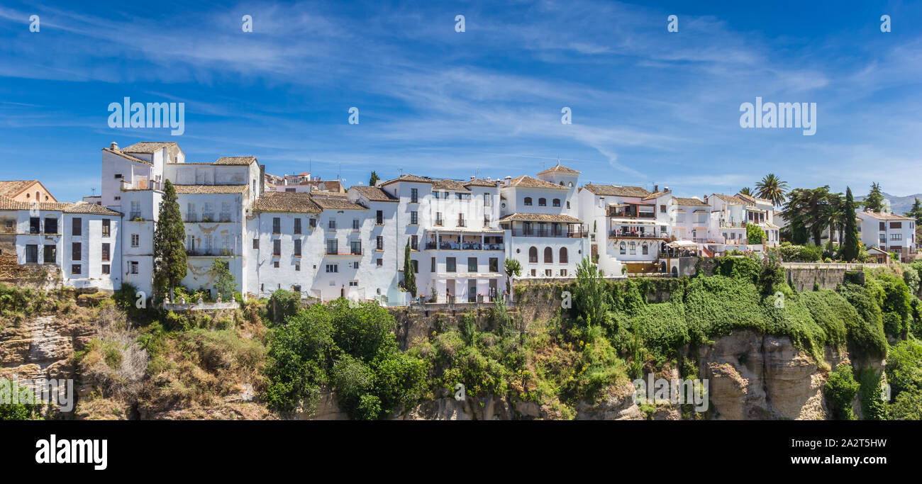 Panorama of white houses at the canyon in historic city Ronda, Spain ...