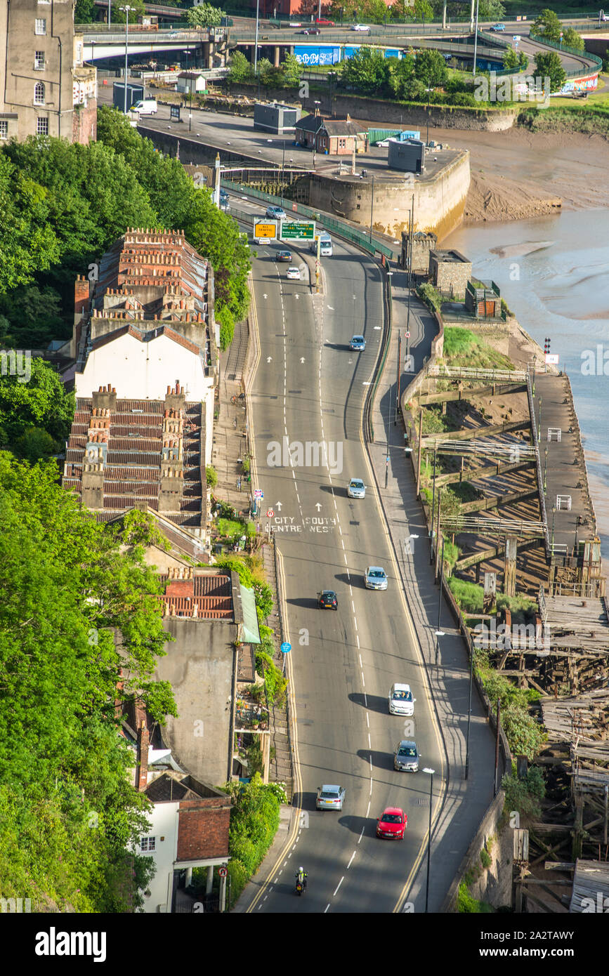 Overhead views down to Hotwells road running along the Avon river, seen from Clifton Suspension Bridge, Bristol, England, UK. Stock Photo