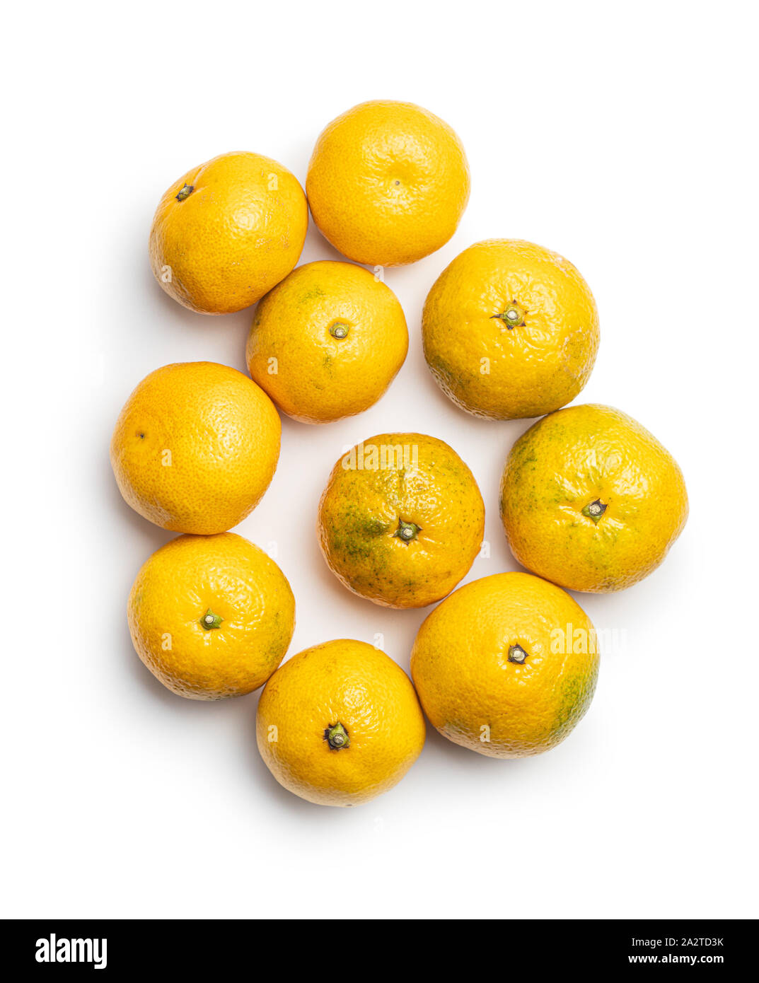 Fresh yellow tangerines isolated on white background. Stock Photo