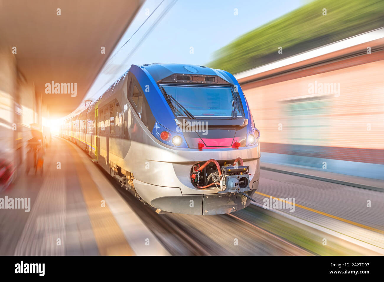 Train high speed rides on a trip at the railway station in the city ...