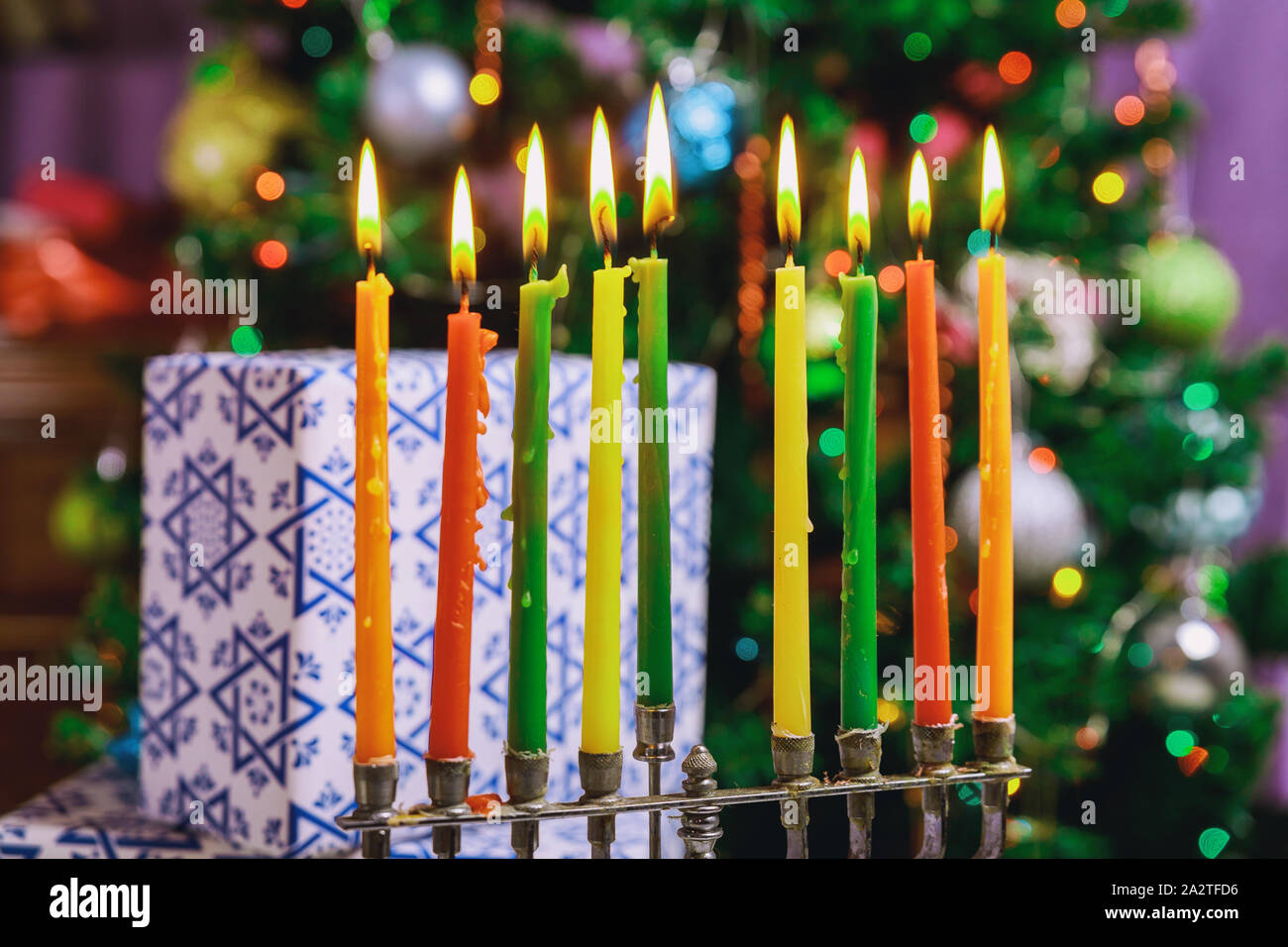 Jewish holiday burning Chanukah candlestick with candles menorah