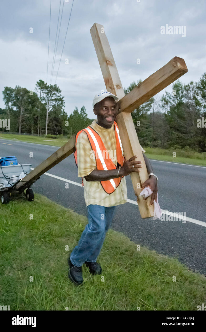 Man walking along highway hires stock photography and images Alamy