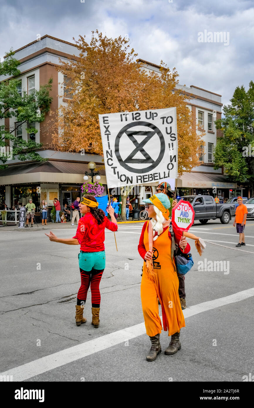 Extinction Rebellion activists shutdown downtown intersection for four minutes to highlight need for change, Nelson, British Columbia, Canada Stock Photo