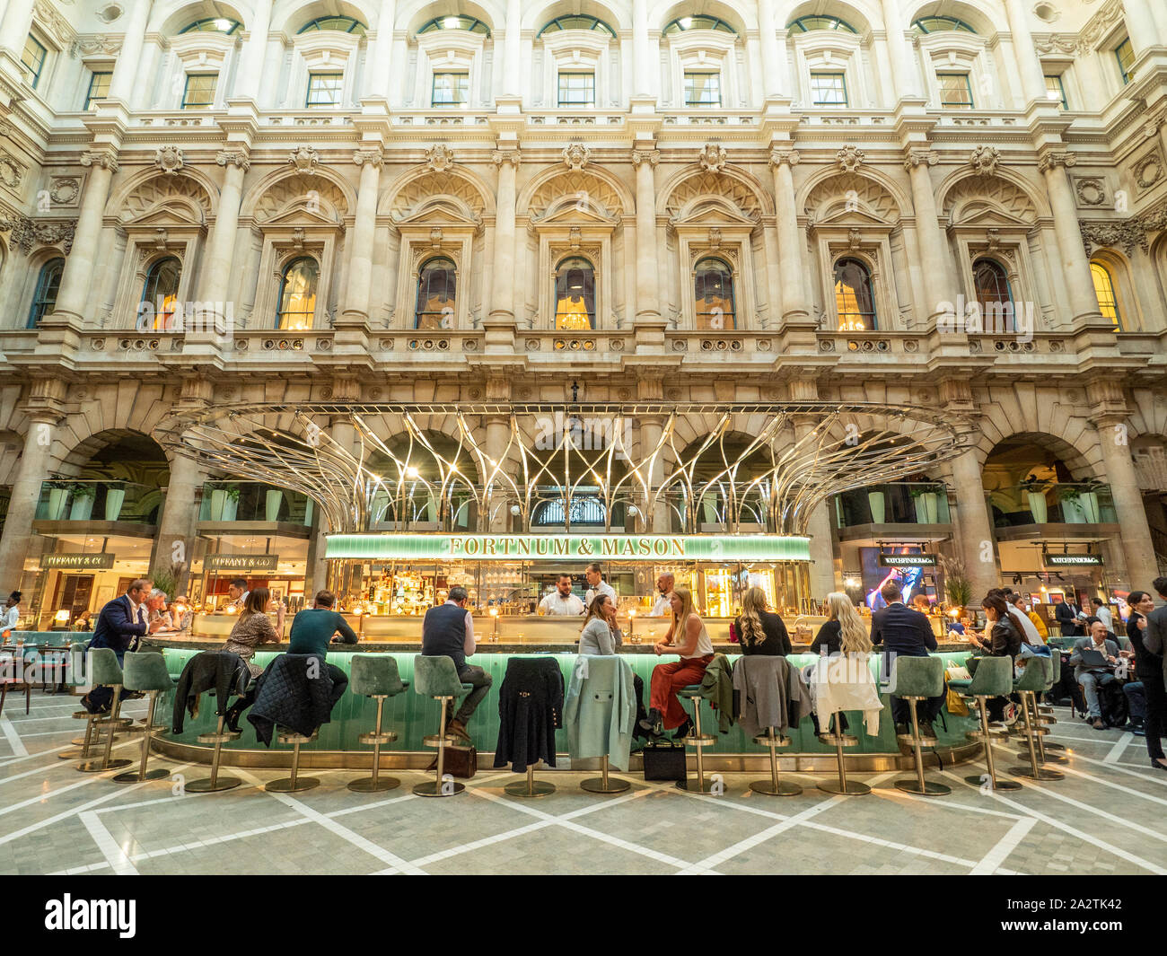 The Royal Exchange, now a luxury shopping location with Fortnum and Mason's bar & restaurant in the middle. London, England. Stock Photo