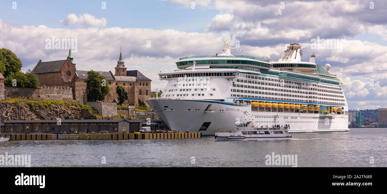 OSLO, NORWAY Ferry passes in front of the Explorer of the Seas, a
