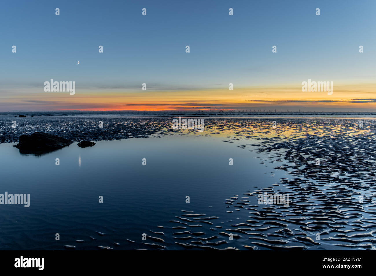 UK Walney Island Sunset. View from Sandy Gap, Walney Island, Barrow-In-Furness on the Cumbrian Coast. Stock Photo