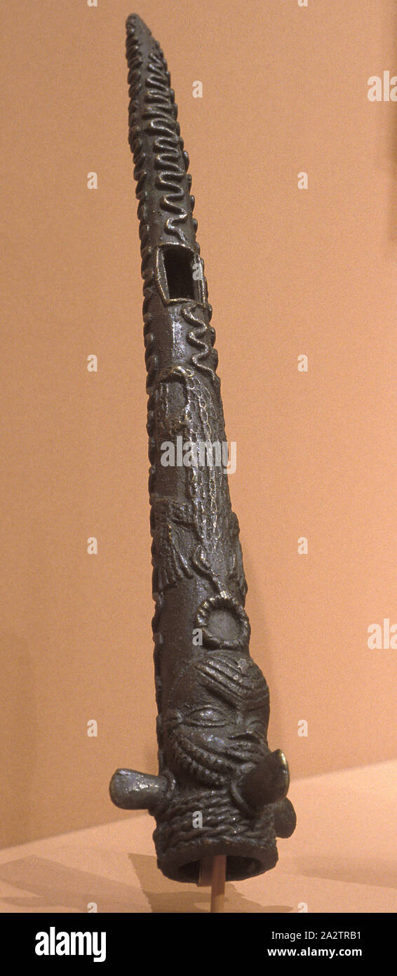 side blown trumpet with crocodile and human head images, Edo people ...