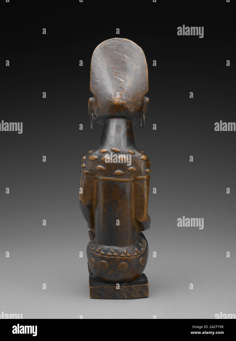 female figure with child (Phemba), Yombe people, late 19th century - early 20th century, wood, brass, glass, 13-1/2 x 4 x 3 in., African Art Stock Photo