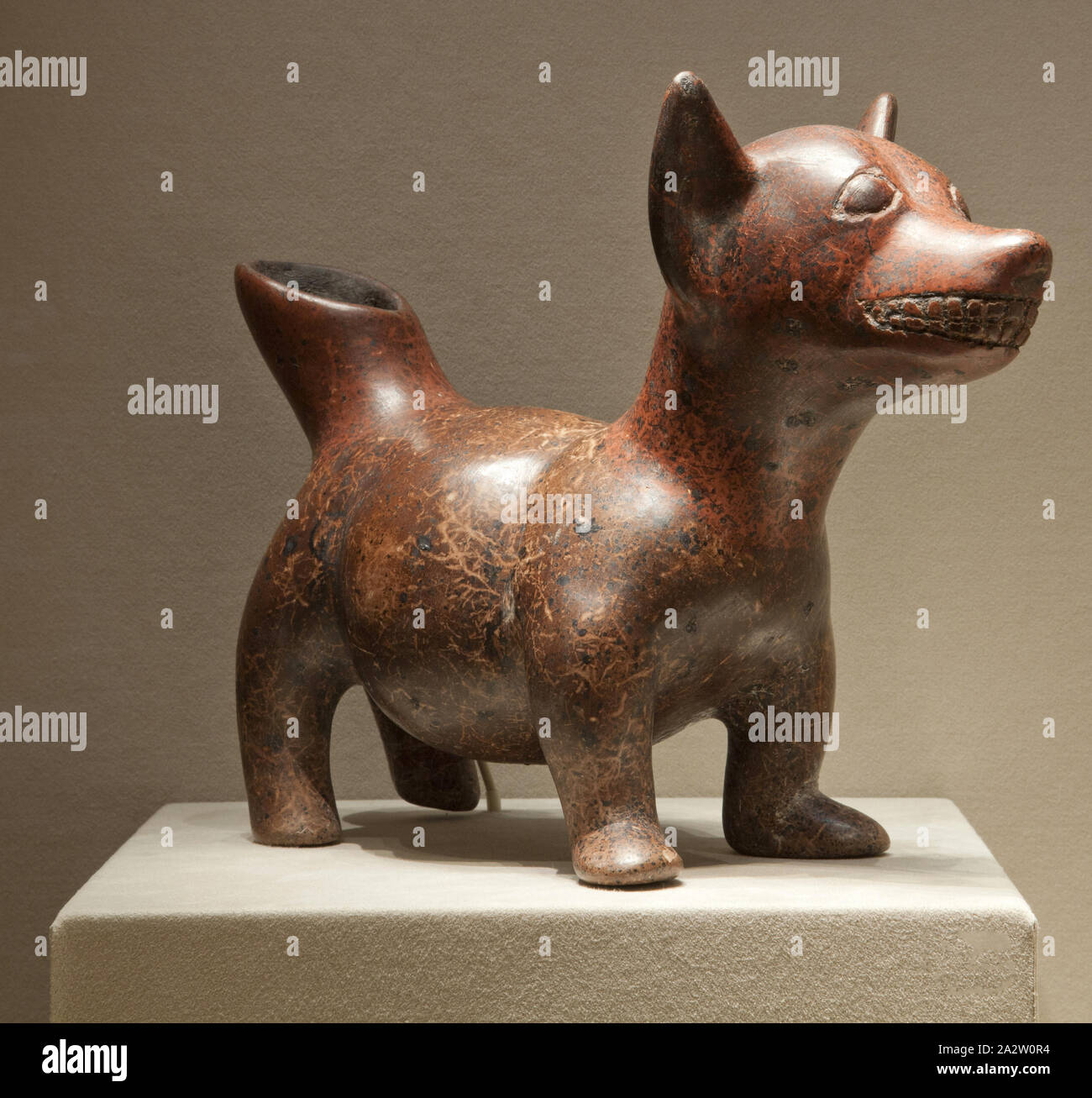 vessel in form of a dog, Colima culture, 200 B.C.E. - 300 C.E., slipped and painted earthenware, 8-5/8 x 11-3/4 x 5 in., Native Arts of the Americas Stock Photo