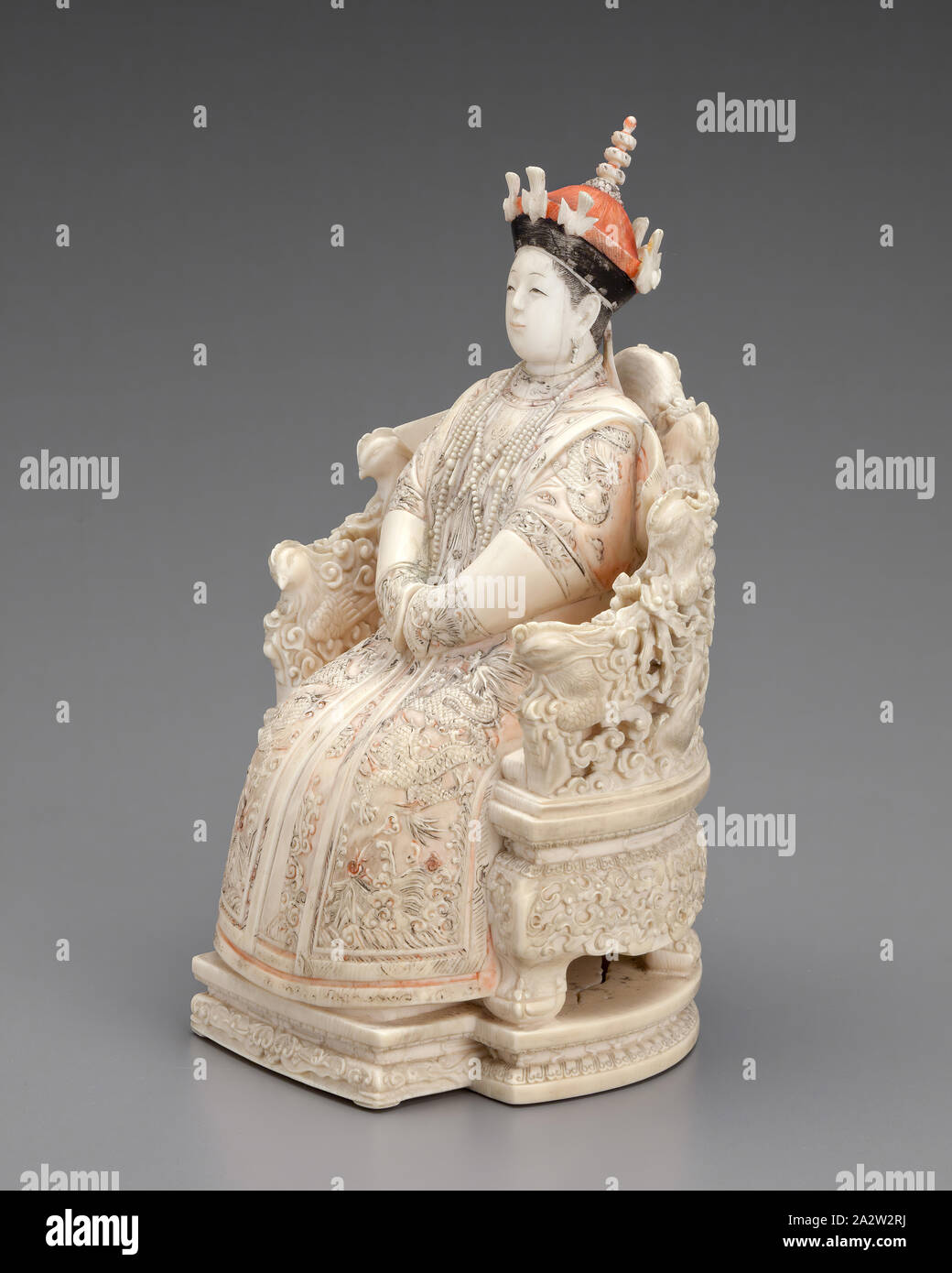Seated Lady, ivory, 7-3/8 in., Asian Art Stock Photo